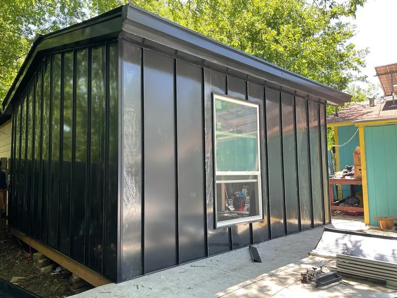 Black standing seam metal wall panels for Metal Roof Installation in Ave Maria