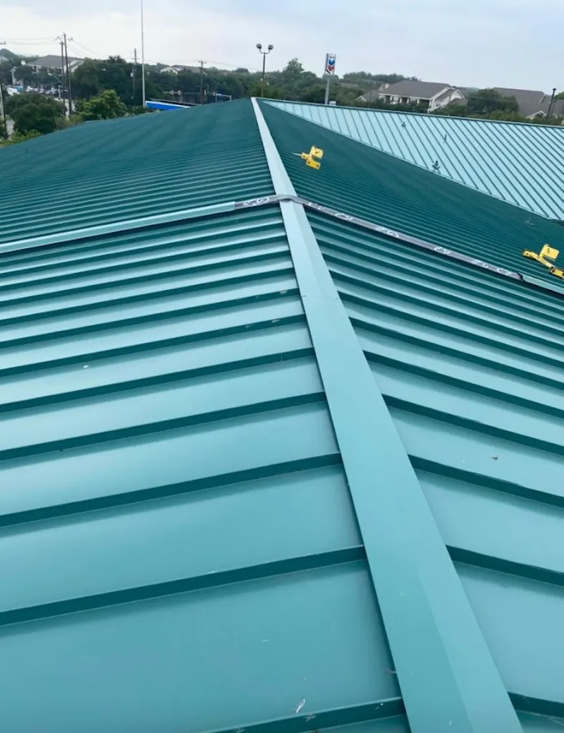Green commercial metal roof ridge and valley for Metal Roof Repair in Ave Maria