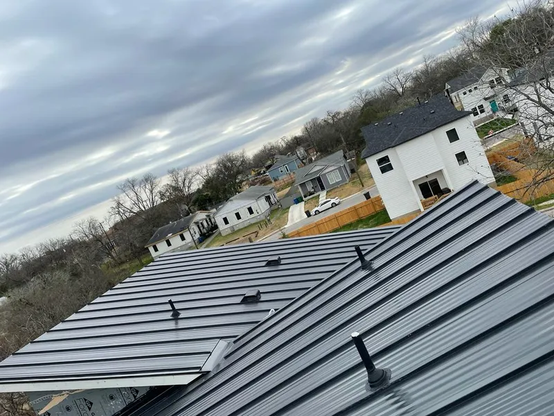 Standing seam metal roof panels with vents for Skylight Repair in Ave Maria